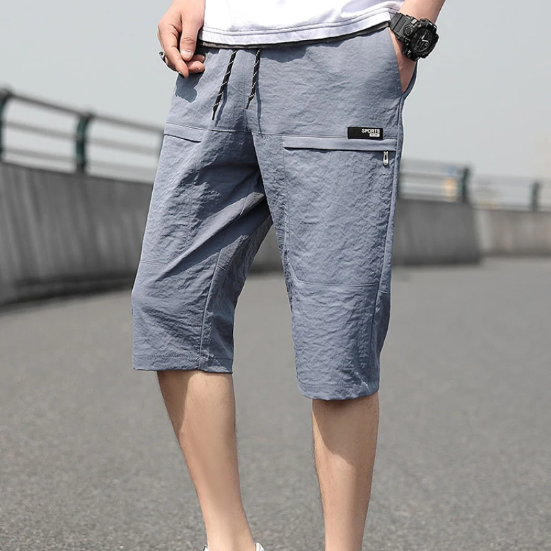 2024 Plus Size Summer Capris Pants Men Breathable Cool Calf-Length Short Sweatpants Straight Loose Casual Cropped Trousers 8XL
