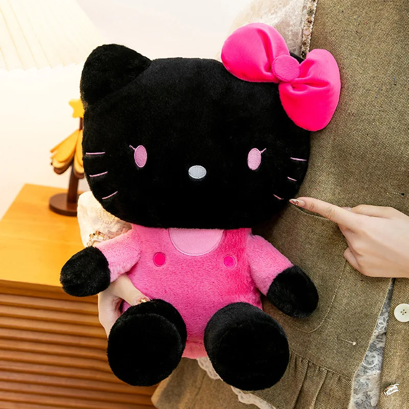 دمية محشوة هلو كيتي (Hello Kitty) باللون الأسود وا...