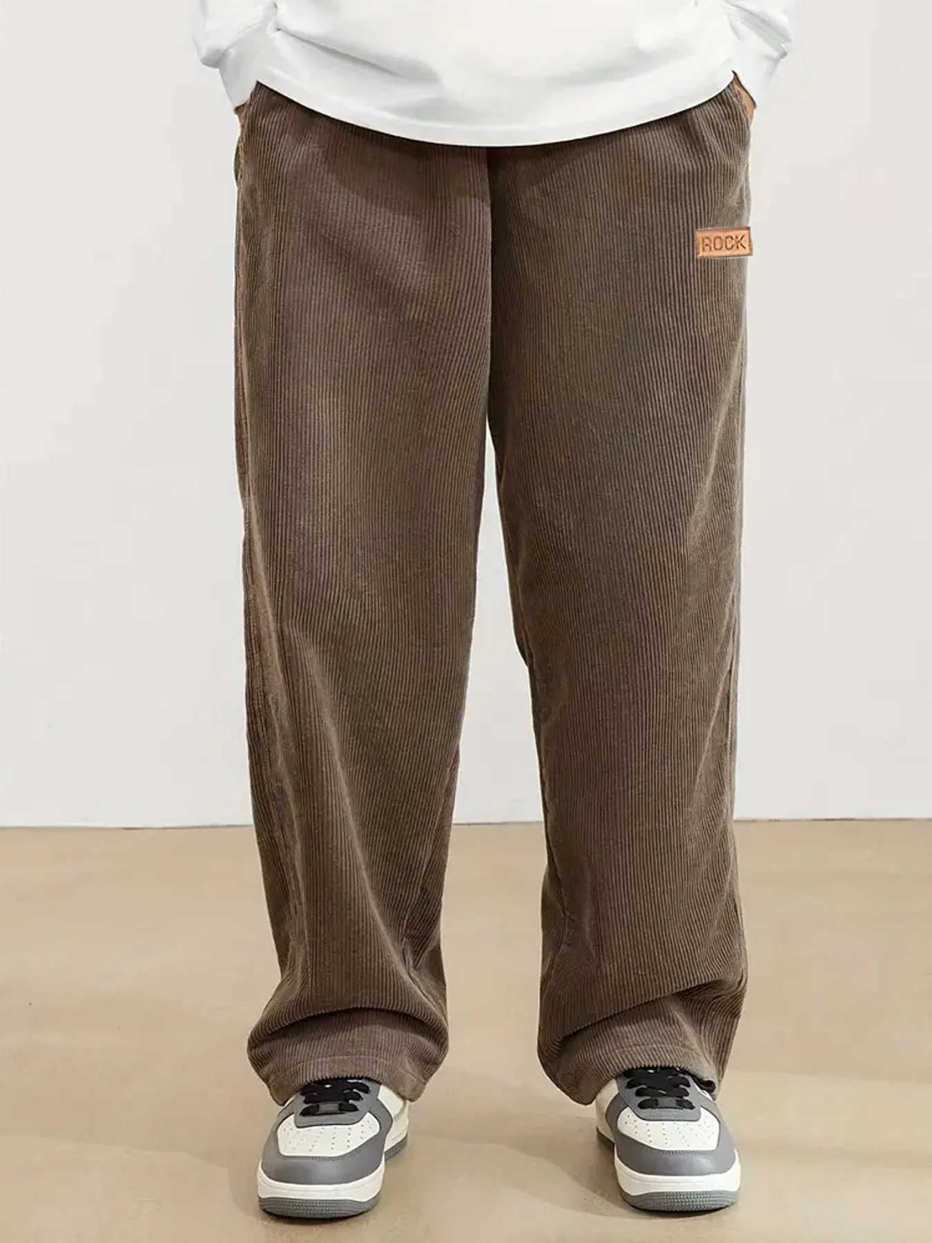 Autumn and winter men's corduroy casual pants with leather label decoration solid color pockets straight leg pants men trousers