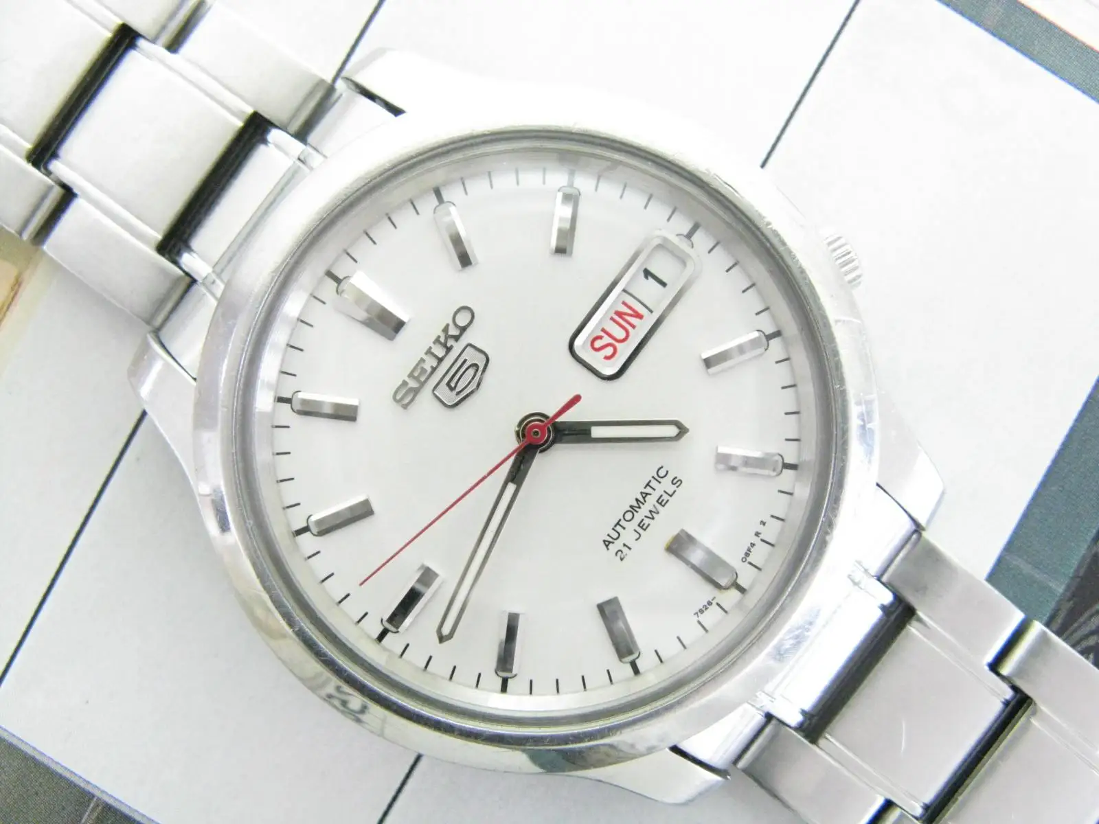 

SNK789K1 Second-hand (Spanish+English) Double calendar transparent back automatic men's watch sapphire 7S26 Seiko 5