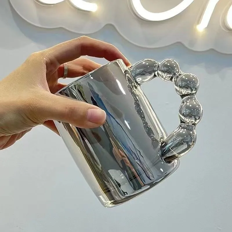 https://ae01.alicdn.com/kf/S5b8384f3dca94d2f9a2ab8ca19bb63c9L/Iridescent-Glass-Coffee-Cup-Ball-Handle-Transparent-Glass-Water-Cup-Mug-Afternoon-Coffee-Water-Cup-Drinkware.jpg