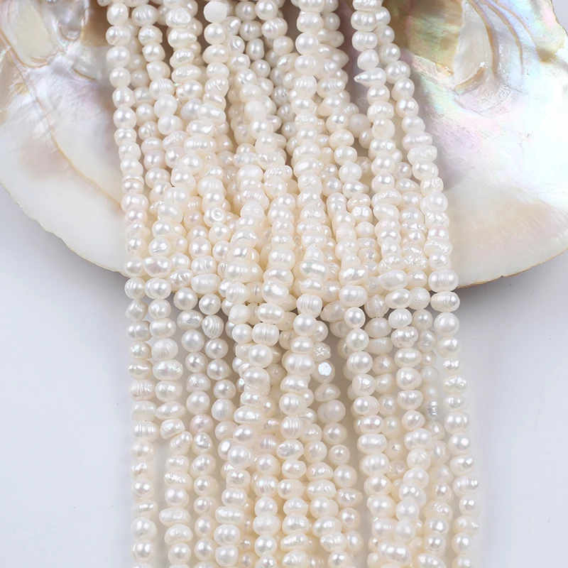 

Wholesale Natural White 5-6mm Potato Freshwater Pearl Strands