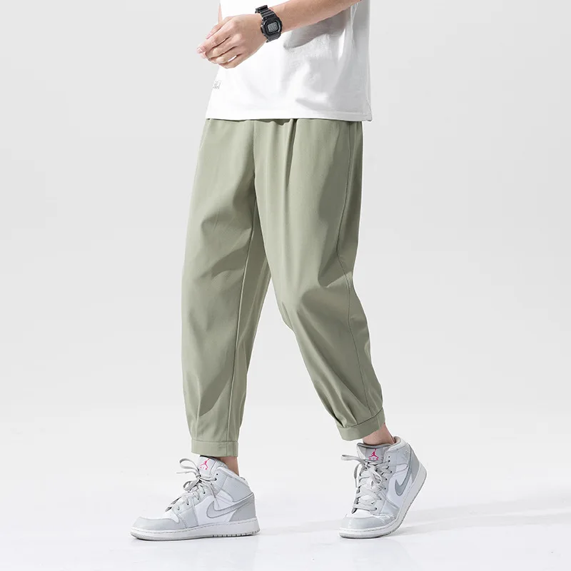 

Summer New Thin Ice Silk Pants Casual Pants Pants Men's Nine Straight Loose Breathable Joker Korean Trousers.