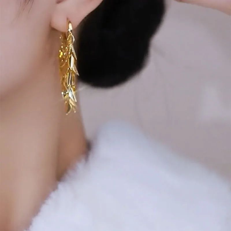 S5b976c4e01e44422b48ea2d0ec0d0bd71 Korean new design fashion jewelry 18K gold plated love ears leaves tassels earrings luxury women's dance party accessories Mallzona