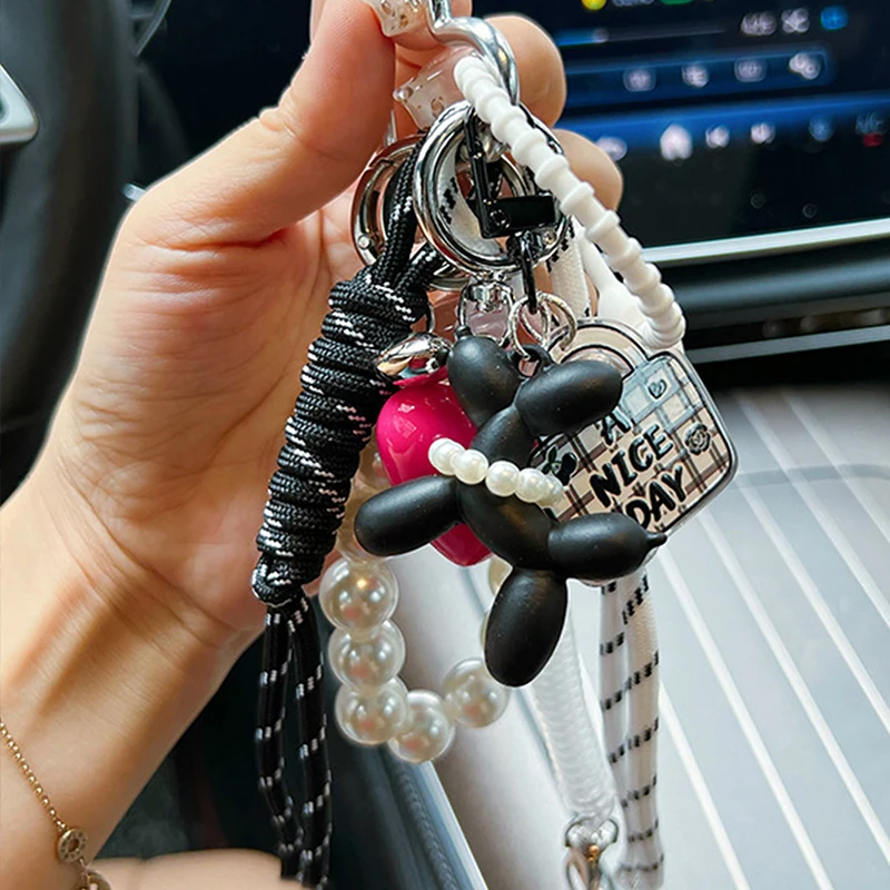 Handmade Delicate Beaded Bow Shaped Keychain with Heart Ornament And Pearl Decoration for Bags And Phones