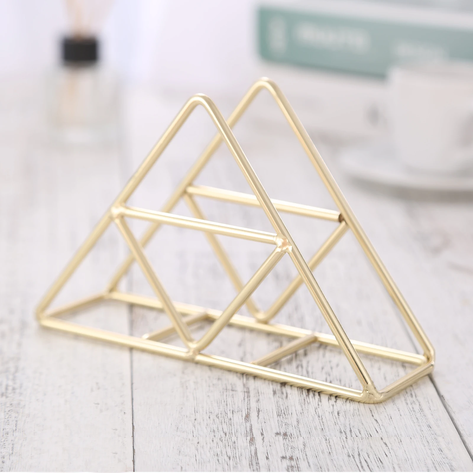 https://ae01.alicdn.com/kf/S5bb4577e10a24434b7c9e1602ce9923cK/Servilletero-triangular-Vertical-de-acero-inoxidable-para-cena-soporte-para-pa-uelos-anillo-dorado-oro-rosa.jpg