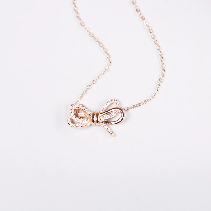 Elegant Sterling Silver Necklace with Bow Pendant and Collarbone Chain for Women Inlaid with Stones - Perfect Gift for Her