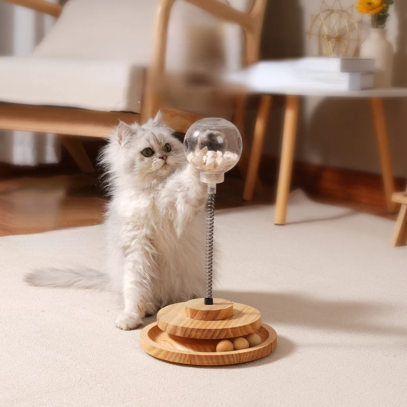 

Solid Wood Rotating Spring Household Cat Leakage Ball Pet Toy Cat Teaser Stick