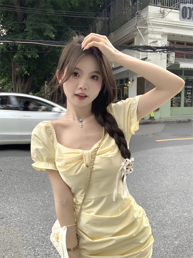 

French Pure Yellow Dress Women's Summer Pleated Short Sleeve Square Neck Temperament Skirt Wrapped Hip Skirt