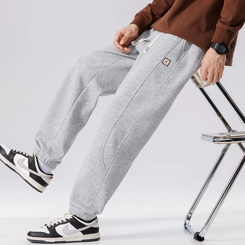Spring Autumn New Solid Color Fashion Elastic Waist Sweatpants Man High Street Casual Loose Pockets Drawstring Cotton Trousers
