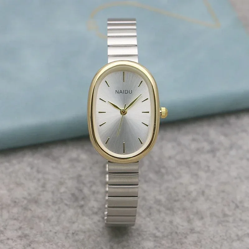 

Luxury Quartz Women's Watches Oval Shaped Fashion Case Small Roman Numeral Dial Female Full Metal Band Watch Niche Wristwatch