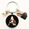 1 Elegant Women Alloy Initial Keychain with Imitation Pearl Vibrant Red Floral Design - Stylish Bag Charm & Perfect Gift for Her 1