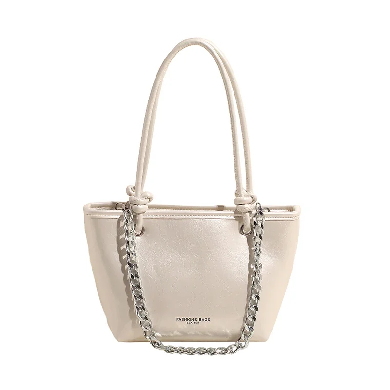 thumbnail image 1 of Bolso de mano de gran capacidad para mujer 2024 Nuevo estilo Bolso bandolera de un solo hombro de alta gama y nicho para el trabajo y los desplazamientos Paquete, 1 of 5