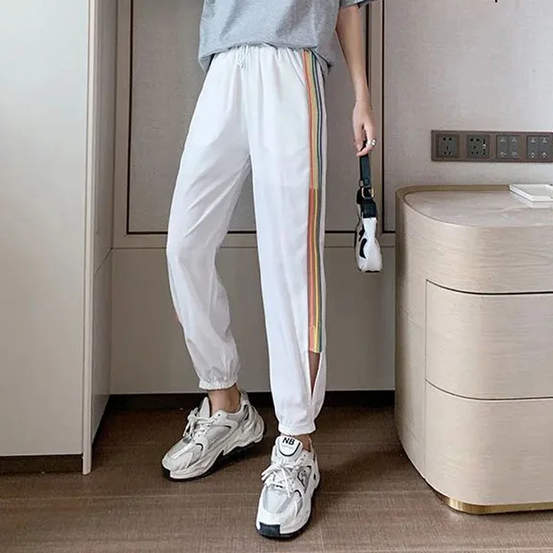 2023 New Summer Fashion Sports Thin Rainbow Lace Hollow Stripe Loose Casual Strap Ice Quick Dried Women's Crop Sweatpants