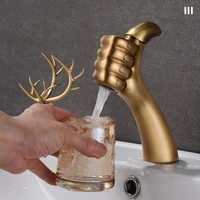 ใหม่ Creative Thumb ก๊อกน้ําห้องน้ําในครัวเรือนห้องน้ําทองเหลืองโบราณอ่างล้างหน้าก๊อกน้ําร้อนและเย็น 2