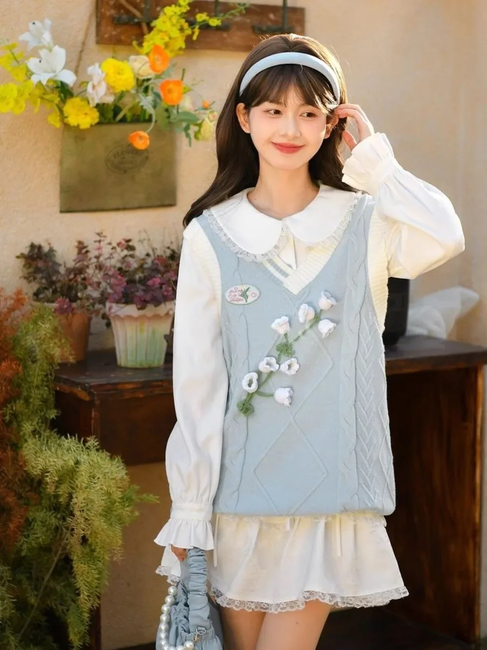 

Vneck waistcoat women wind chime flowers threedimensional decorative embroidery twist knit sweater layering tops womensweetstyle