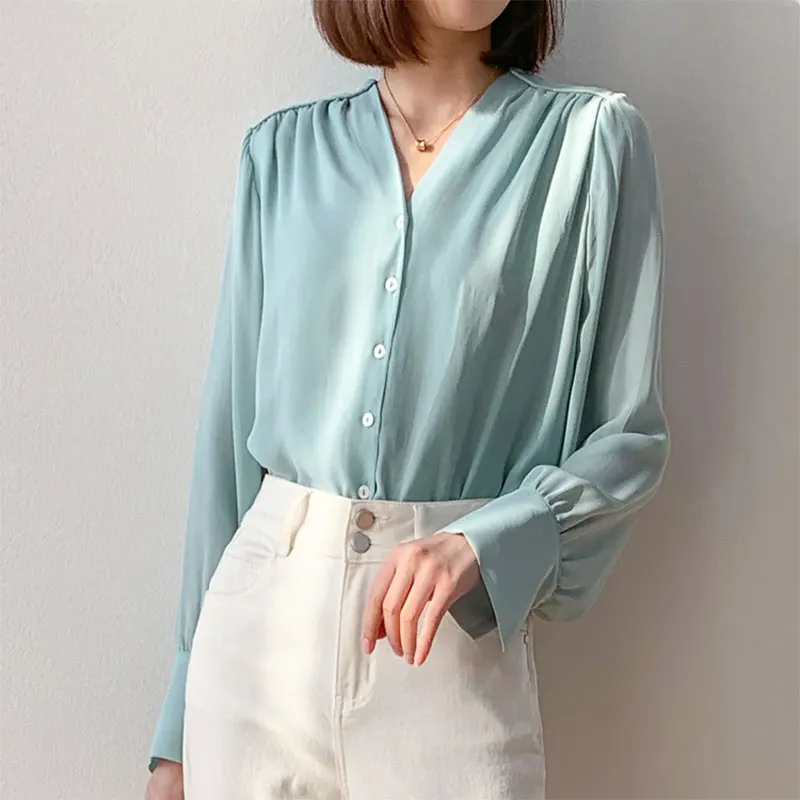 aqua silk blouse