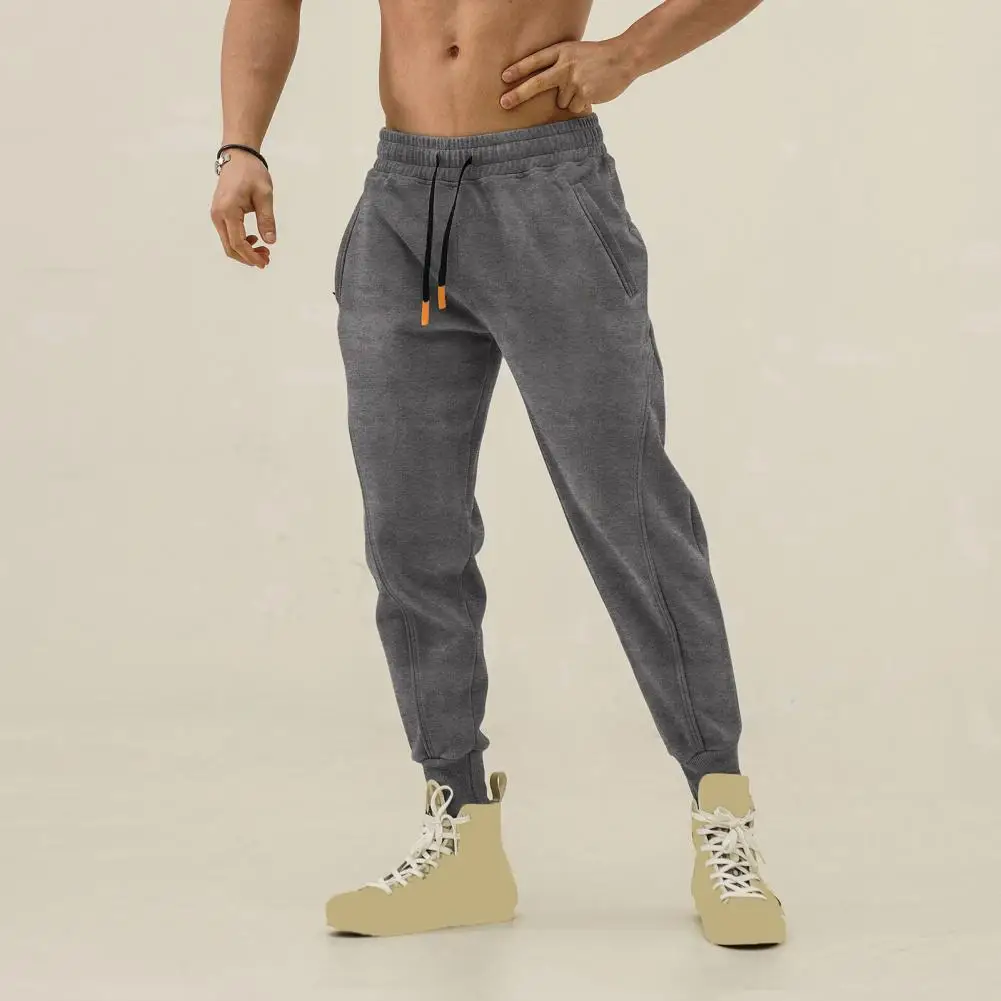 Description Picture 6 of itemMen Sport Pants Loose Ankle-banded Side Pockets Drawstring Elastic Waist Soft Breathable Solid Color Gym Traning Jogging Sweatpa