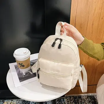 Zaino casual alla moda Mini zaini da donna Borsa da donna in nylon di tendenza Borse da scuola piccole Zaino bianco per ragazze adolescenti