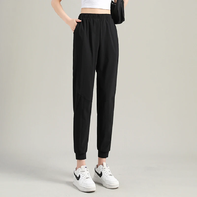 New Fashion Versatile Quick Dried Ice Silk Sports 9-Point Trousers Women'S Elastic Summer Thin Loose Casual Harlan Pants Female fashion casual women loose harlan pants spring summer thin streetwear new striped elastic high waist black straight trousers 3xl