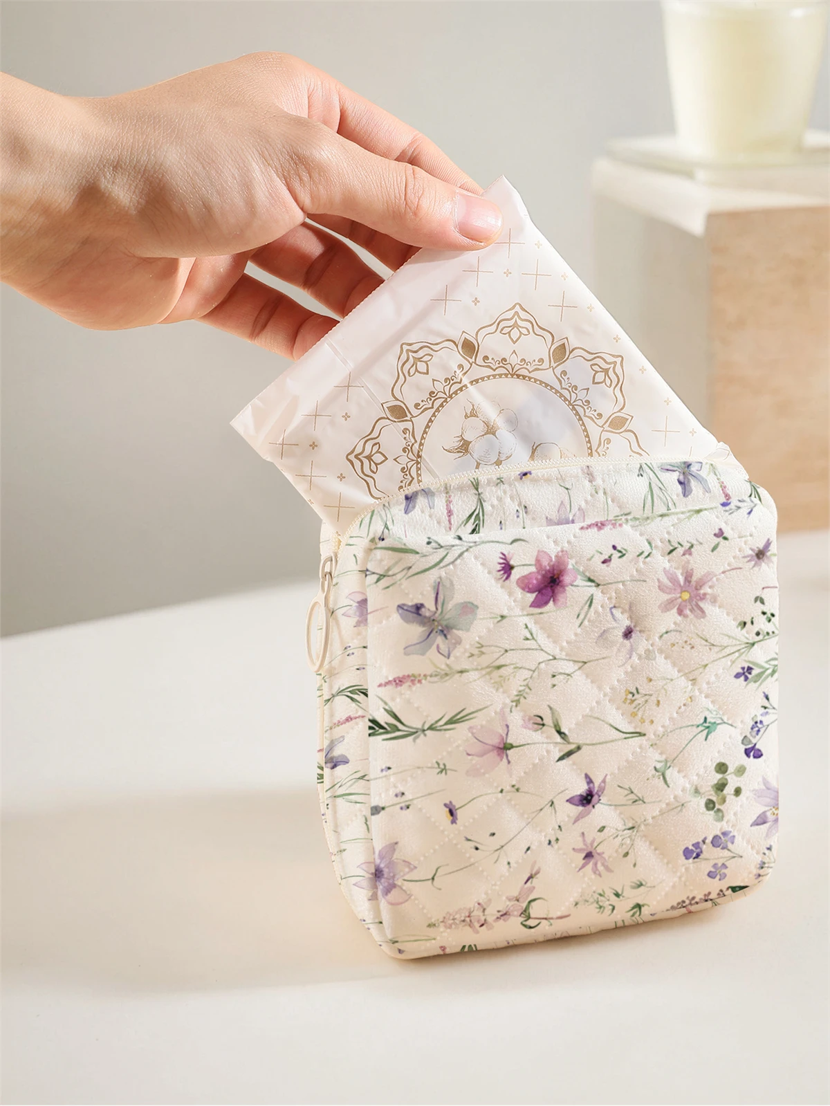 1 portable sanitary napkin storage bag, featuring floral patterns and diamond mesh material, lightweight women's tissue bag