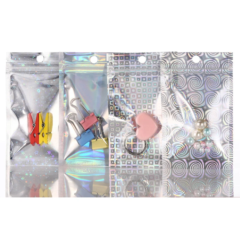 50pcs Star Spiral Pattern Silver Laser Foil Pouch Resealable Mylar Plastic Bags Ziplock Bags for Jewelry Display Wrap Packaging 50pcs thicken plastic zip lock bags resealable mylar pouches no hole bag for diy jewelry packaging display wrap retail bags