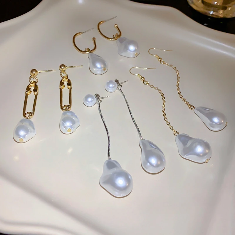 

New Irregular Pearl Snake Bone Chain Tassel Earrings French Niche Design Temperament Hook Earrings Fashion Women's Jewelry