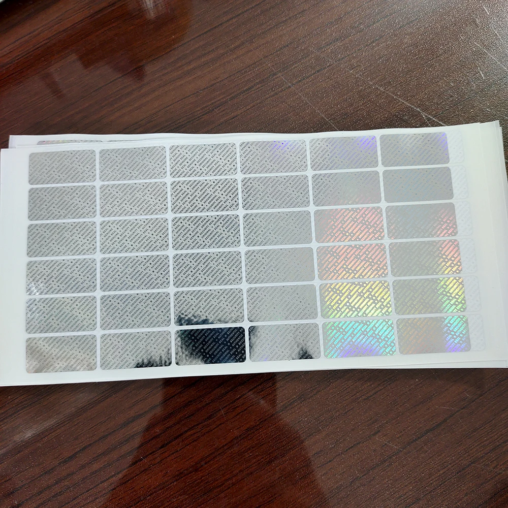 

10000pcs 24x12mm Hologram Security Seal GENUINE AUTHENTIC ORIGINAL Label Sticker VOID Left If Tampered Removal Proof