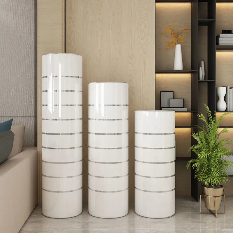 

Modern high-tech ozone intelligent disinfection 360 degree rotating plug-in narrow and high cylindrical shoe cabinet shoe rack