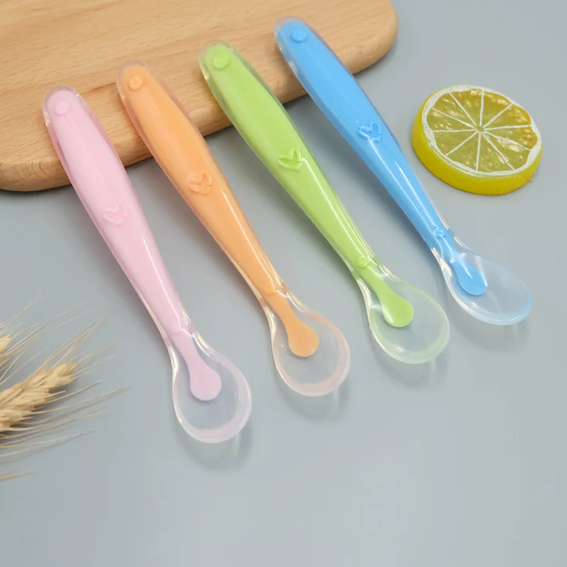 

Baby Soft Silicone Spoon - Candy Color Temperature Sensing Spoon - Essential Baby Feeding Tools for Easy and Safe Feeding Exper