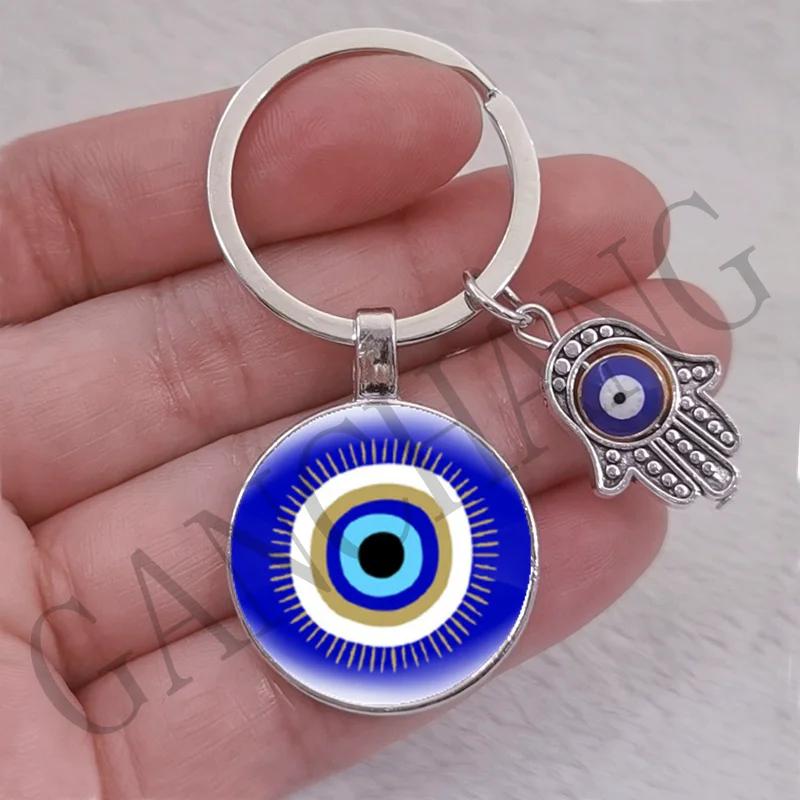 Simpatico portachiavi con occhio turco, 1 pezzo da 10 mm con perline blu a forma di mano di Fatima, elefante, gufo, farfalla, varie forme, D3., 1