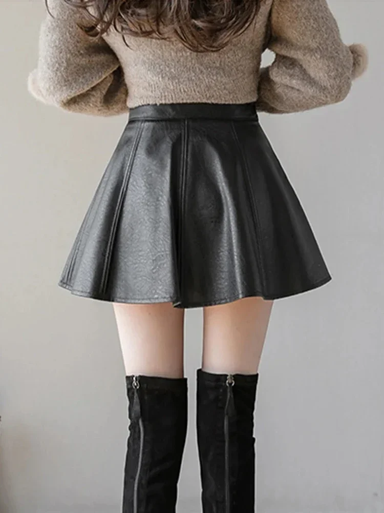 가을 패션 여성 솔리드 컬러 PU Pleated 스커트 겨울 슬림 맞는 높은 허리 독특한 지퍼가 달린 여성 미니 가죽 스커트