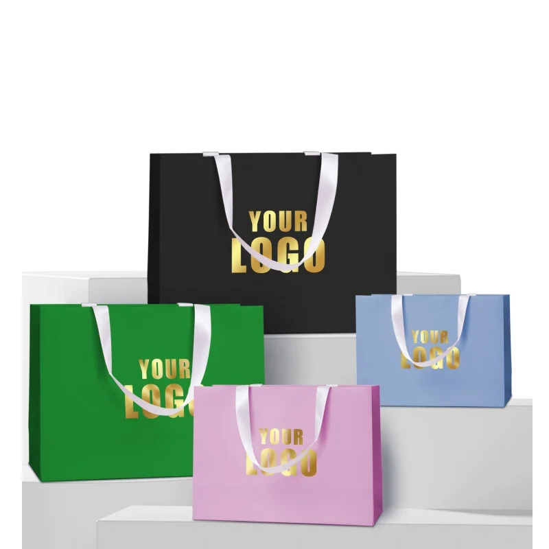 

Fashion customized bronzing logo garment paper bags with your own logo
