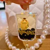 Netizens can reach duck keychains with oil floating cartoon figurine keychains, quicksand bottle pendants 4