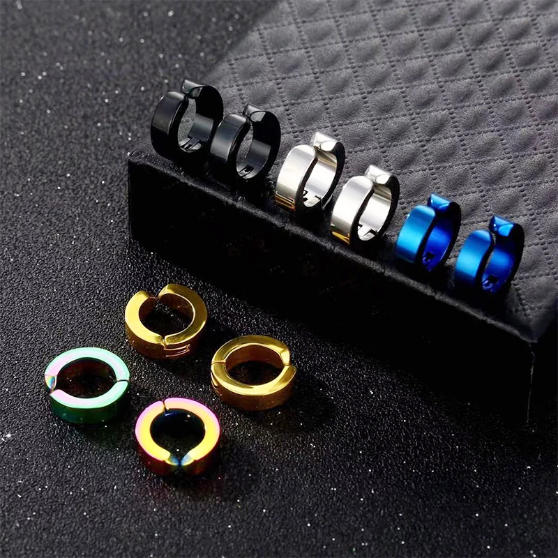 Different angles of the black stainless steel clip-on hoop earrings