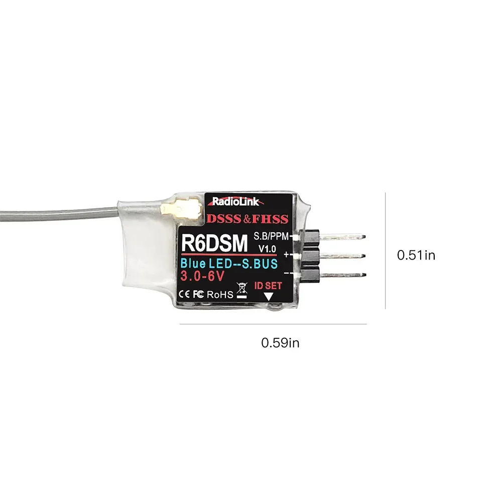 Récepteur Radiolink R6DSM 1g posé sur une surface, connecteurs visibles