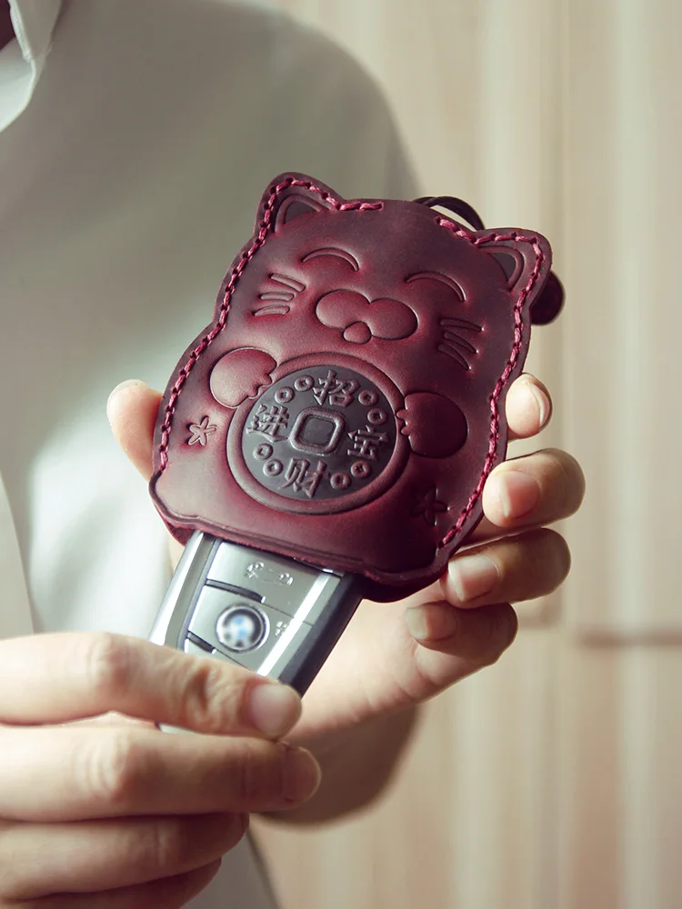 

Car Key Bag Women's Universal Genuine Leather Lucky Cat Hand Hold Pullable Cute Pullable Car Key Case 2024 New