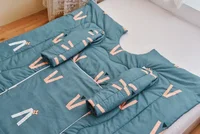 Multifunctional car pillow is covered with sleeves and can be worn on sofa legs to keep warm and prevent kicking. 1