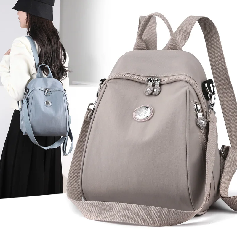 

2023 new foreign trade backpack women's printed trendy nylon bag casual fashion high-end travel small backpack