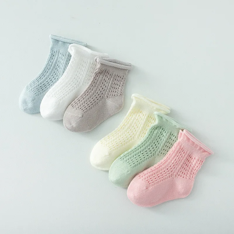 

A pair of children's socks rolled edge loose mouth feet baby summer mesh thin model spring and summer 0-3 years old