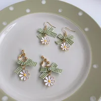 Korean Forest Series Fresh Little Daisy Clip on Earrings No Piercing Vintage Lattice Bow Daisy Flower Ear Clip Earrings Women 1