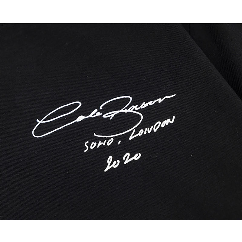 T-shirt oversize da uomo con stampa in sanscrito in cotone_voghion.com