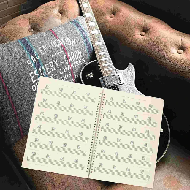 Livre de guitare, carnet de musique, instrument de partition