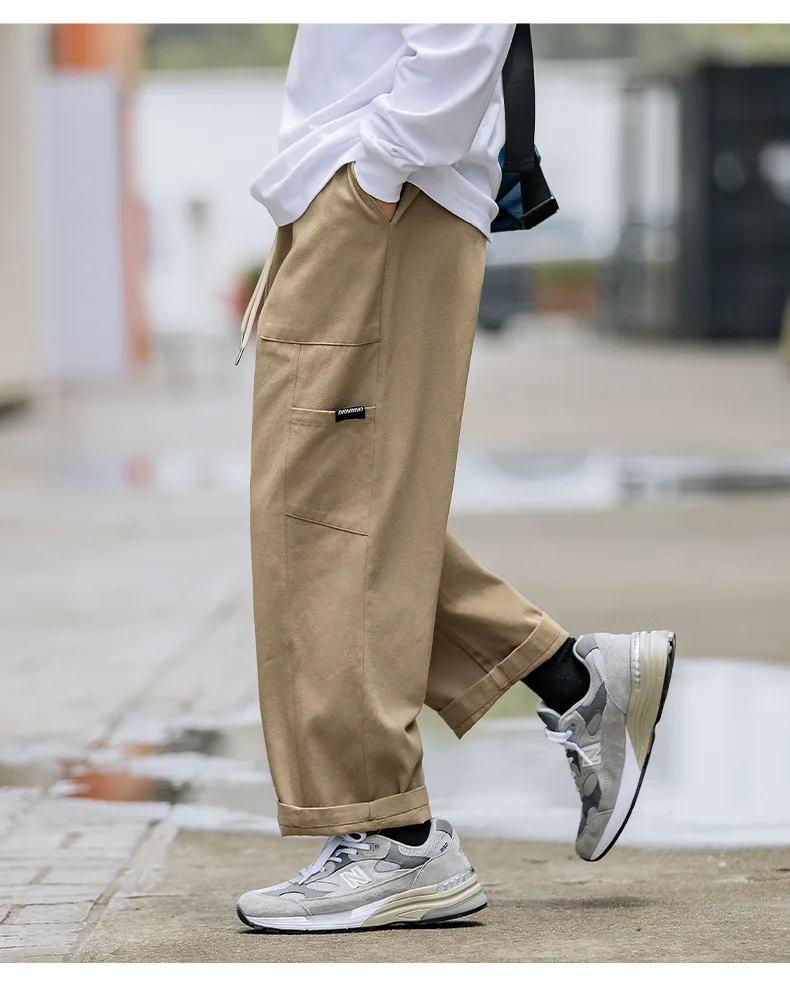 Work casual pants straight tube splicing patch pocket design feeling long cargo pants men baggy pants