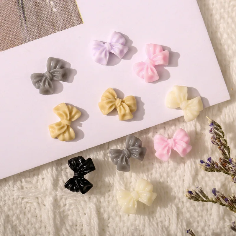 50PCS 미니 3D 아크릴 네일 아트 보우 매력 액세서리 가짜 손톱 장식 용품에 대 한 귀여운 수 지 Bowknot 매니큐어 재료
