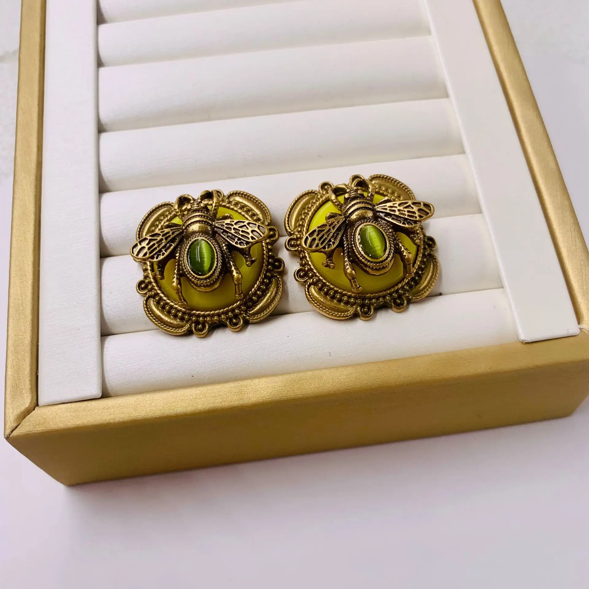 

Medieval vintage enamel stereo bee earrings