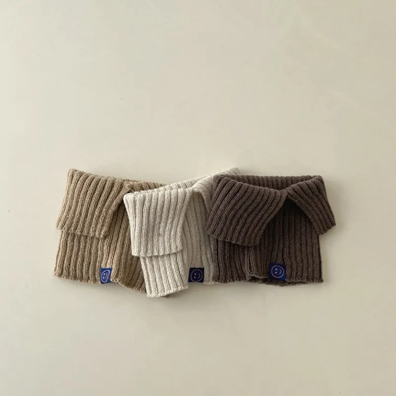 

Children's scarf autumn and winter Korean version solid color smiley face logo knitted wool baby neck cover to keep warm baby ne