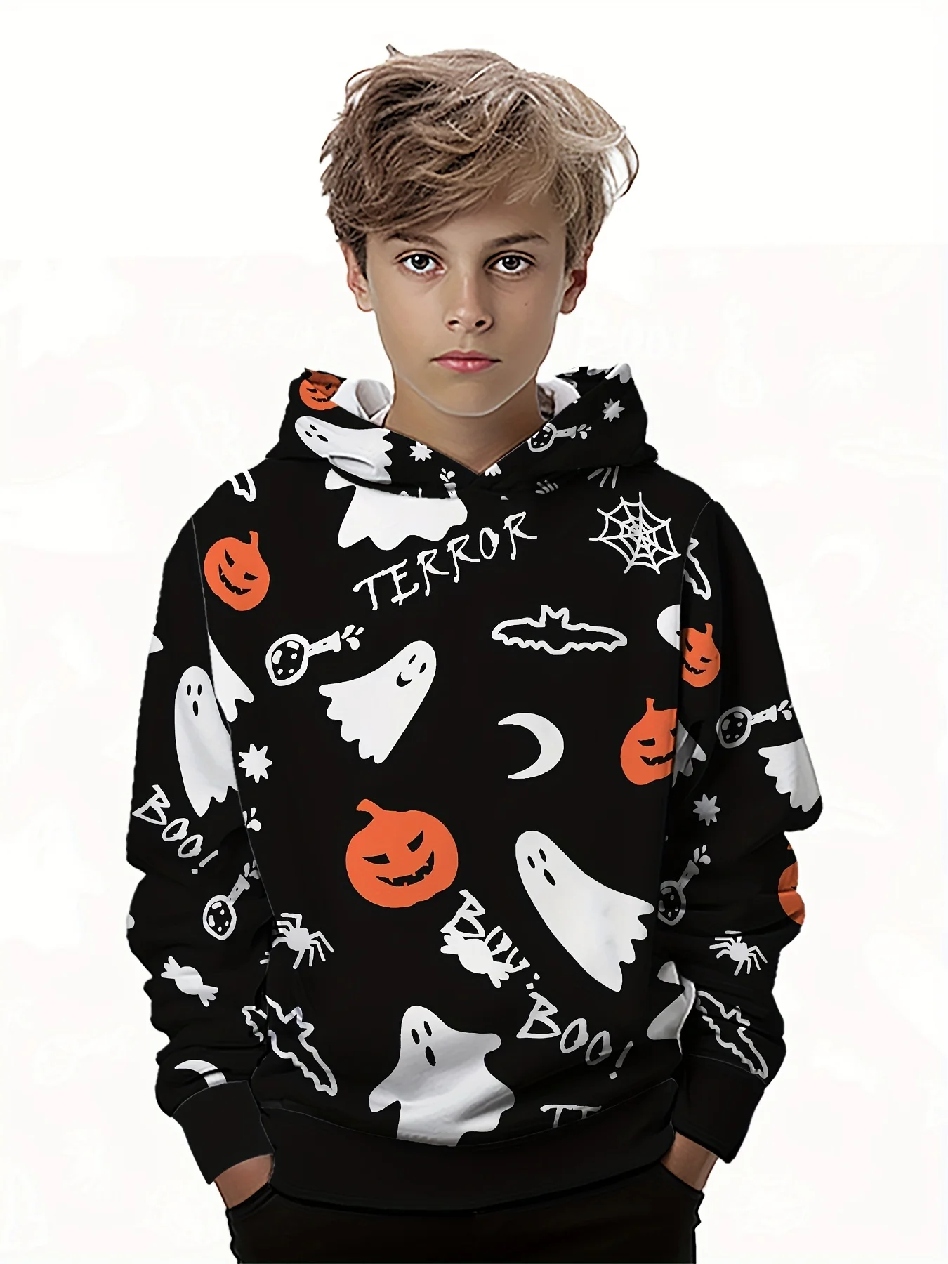 Smiling bpy wearing a colorful 3D hoodie with long sleeves, standing outdoors with playful energy halloween