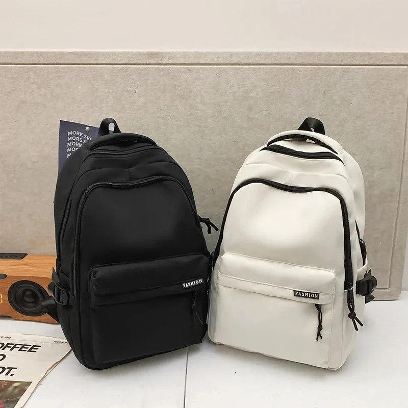 Large Capacity Solid Color Student Backpack Junior and high school simple black travel backpack 1