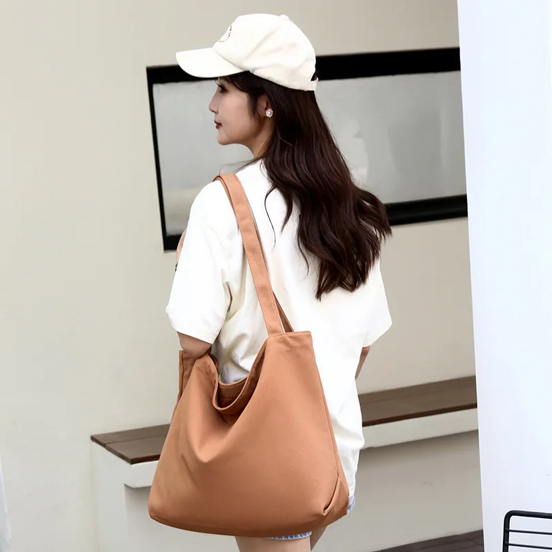 Women's Tote Bag 2024 New Minimalist Canvas Solid Color Shopping Leisure Commuting Exquisite Large Capacity Shoulder Bag
